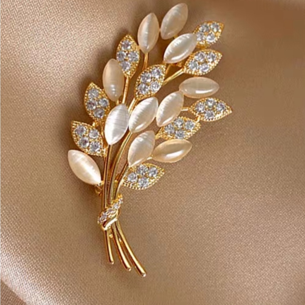 Golden flower brooch